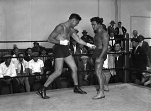 Jim Londos (right) in a ring with professional boxer Jack Dempsey.